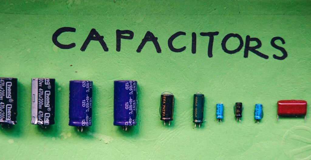 Consider a Charged Parallel-Plate Capacitor: How Can Its Capacitance Be Halved?